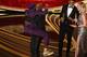 Best Adapted Screenplay nominee for 'BlacKkKlansman' Spike Lee (L) jumps in the arms of Actor Samuel L. Jackson as he accepts the award for Best Original Screenplay during the 91st Annual Academy Awards at the Dolby Theatre in Hollywood, California on February 24, 2019. (Photo by VALERIE MACON / AFP) (Photo credit should read VALERIE MACON/AFP/Getty Images)