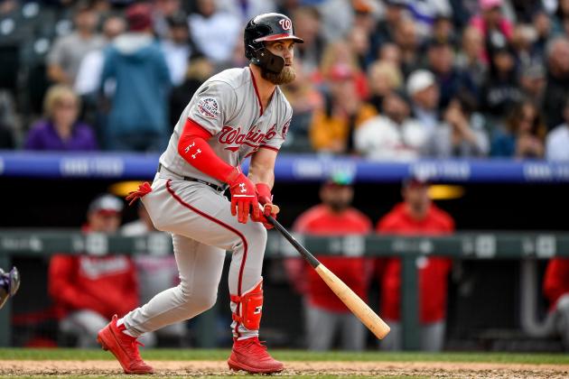 DENVER, CO - SEPTEMBER 30:  Bryce Harper #34 of the Washington Nationals hits a ninth inning double against the Colorado Rockies at Coors Field on September 30, 2018 in Denver, Colorado.  (Photo by Dustin Bradford/Getty Images)