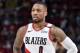 Cleveland, Ohio - February 25: Damian Lillard # 0 of the Portland Trail Blazers watches during the game against the Cleveland Cavaliers on February 25, 2019 at Quicken Loans Arena in Cleveland, Ohio. NOTE TO THE USER: The user acknowledges and expressly agrees that, by downloading and / or using this photo, the user consents to the terms and conditions of the Getty Images License Agreement. Compulsory Copyright Notice: Copyright 2019 NBAE (Photo by David Liam Kyle / NBAE via Getty Images)