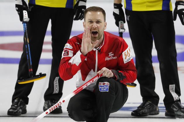 Canada skip Brad Gushue yells to sweepers after delivering a stone against Sweden during a gold medal game at the World Men's Curling Championship, Sunday, April 8, 2018, in Las Vegas. (AP Photo/John Locher)