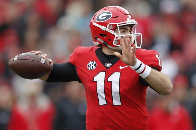 Georgia quarterback Jake Fromm (11) looks to pass during the first half of an NCAA college football game against Georgia Tech Saturday, Nov. 24, 2018, in Athens, Ga. (AP Photo/John Bazemore)