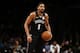 Brooklyn Nets guard Spencer Dinwiddie (8) in action against the Washington Wizards during the second half of an NBA basketball game Friday, Dec. 14, 2018, in New York. The Nets won 125-118. (AP Photo/Adam Hunger)