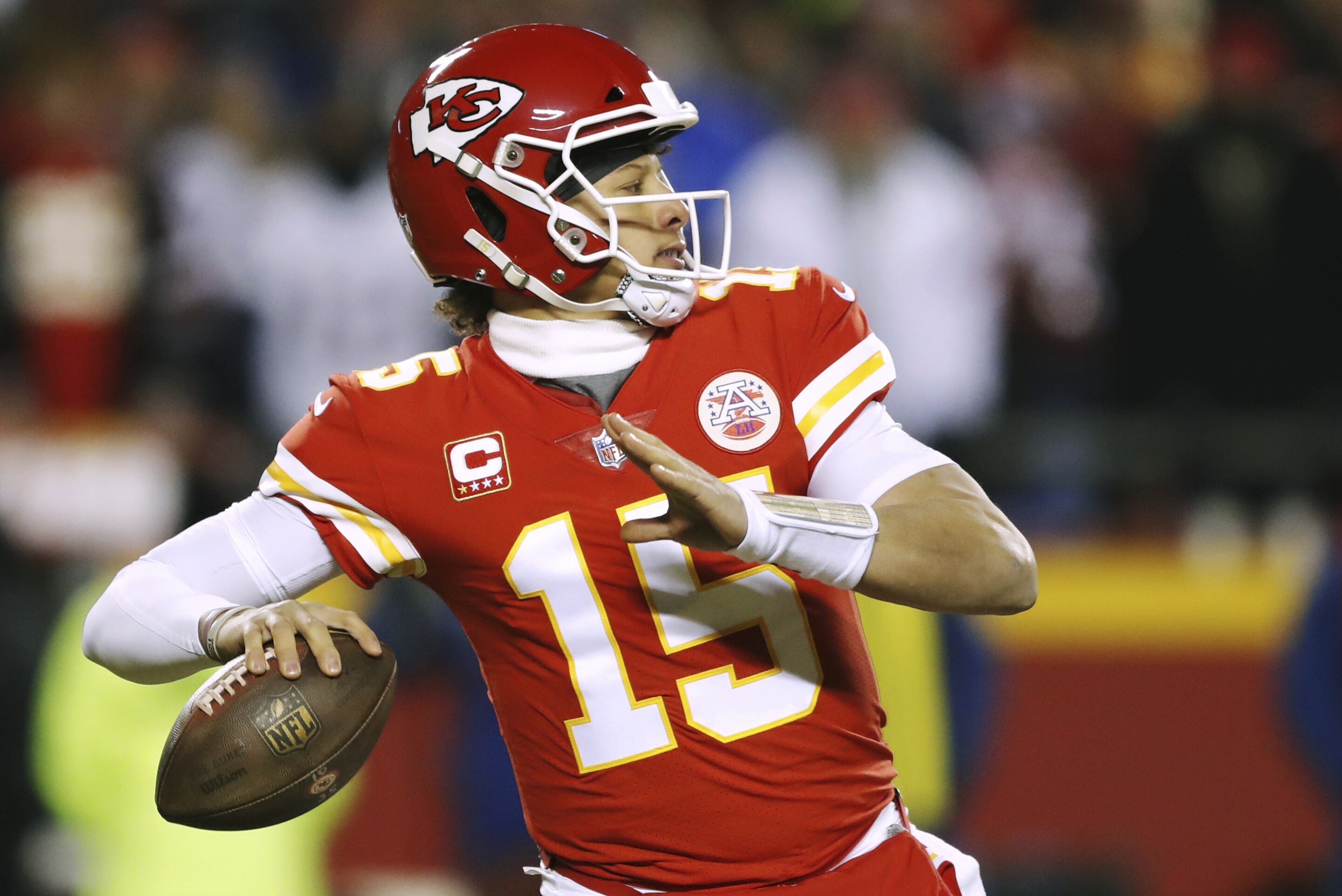 Kansas City Chiefs quarterback Patrick Mahomes throws a pass during the first half of the AFC Championship NFL football game against the New England Patriots, Sunday, Jan. 20, 2019, in Kansas City, Mo. (AP Photo/Charlie Neibergall)