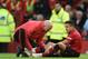 Manchester United's Chilean striker Alexis Sanchez (R) receives medical attention after picking up an injury during the English Premier League football match between Manchester United and Southampton at Old Trafford in Manchester, north west England, on March 2, 2019. (Photo by Oli SCARFF / AFP) / RESTRICTED TO EDITORIAL USE. No use with unauthorized audio, video, data, fixture lists, club/league logos or 'live' services. Online in-match use limited to 120 images. An additional 40 images may be used in extra time. No video emulation. Social media in-match use limited to 120 images. An additional 40 images may be used in extra time. No use in betting publications, games or single club/league/player publications. / (Photo credit should read OLI SCARFF/AFP/Getty Images)