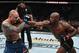 LAS VEGAS, NV - MARCH 02: Jon Jones punches Anthony Smith in their UFC light heavyweight championship bout during the UFC 235 event at T-Mobile Arena on March 2, 2019 in Las Vegas, Nevada. (Photo by Jeff Bottari/Zuffa LLC/Zuffa LLC)