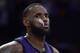 Los Angeles Lakers forward LeBron James paues during the closing seconds of the team's NBA basketball game against the Milwaukee Bucks on Friday, March 1, 2019, in Los Angeles. The Bucks won 131-120. (AP Photo/Mark J. Terrill)