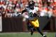 CLEVELAND, OH - OCTOBER 12: Le'Veon Bell #26 of the Pittsburgh Steelers carries the ball against the Cleveland Browns at FirstEnergy Stadium on October 12, 2014 in Cleveland, Ohio. (Photo by Gregory Shamus/Getty Images)
