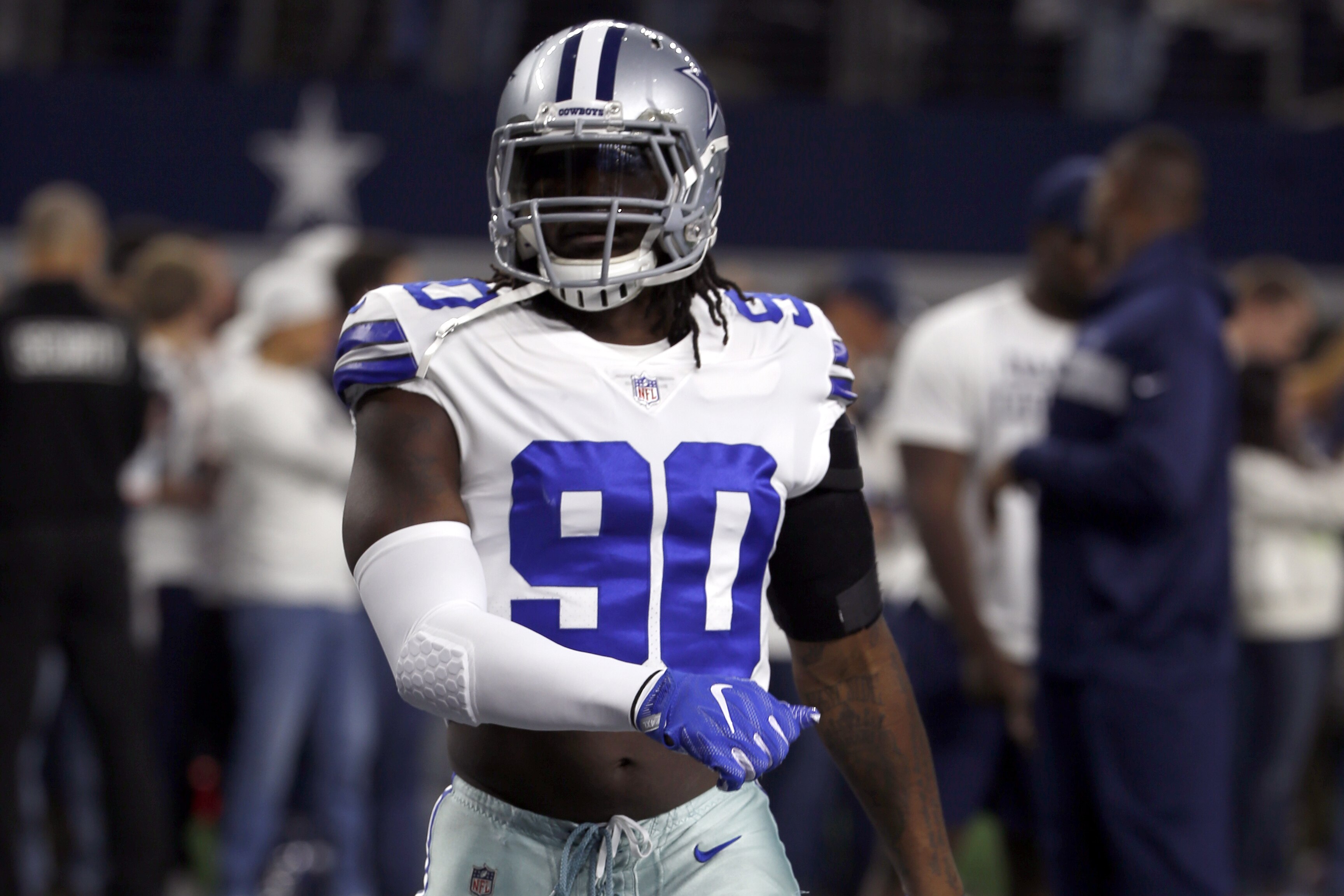 Dallas Cowboys defensive end DeMarcus Lawrence (90) warms up before an NFC wild-card NFL football game against the Seattle Seahawks in Arlington, Texas, Saturday, Jan. 5, 2019.(AP Photo/Ron Jenkins)
