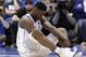 Duke's Zion Williamson sits on the floor following a injury during the first half of an NCAA college basketball game against North Carolina, in Durham, N.C., Wednesday, Feb. 20, 2019. Duke might have to figure out what the Zion Show will look like without its namesake. All because of a freak injury to arguably the most exciting player in college basketball. As his Nike shoe blew out, Williamson sprained his right knee on the first possession of what became top-ranked Duke's 88-72 loss to No. 8 North Carolina.(AP Photo/Gerry Broome)