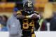Pittsburgh Steelers wide receiver Antonio Brown (84) warms up before an NFL football game against the New England Patriots in Pittsburgh, Sunday, Dec. 16, 2018. (AP Photo/Keith Srakocic)