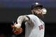 Houston Astros starting pitcher Dallas Keuchel throws against the Seattle Mariners in the first inning of a baseball game Wednesday, Aug. 1, 2018, in Seattle. (AP Photo/Elaine Thompson)