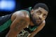 Boston Celtics' Kyrie Irving stands on the court during a stoppage in play during the second half of an NBA basketball game against the Houston Rockets in Boston, Sunday, March 3, 2019. (AP Photo/Michael Dwyer)