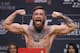 Conor McGregor poses during a ceremonial weigh-in for the UFC 229 mixed martial arts fight Friday, Oct. 5, 2018, in Las Vegas. McGregor is scheduled to fight Khabib Nurmagomedov Saturday in Las Vegas. (AP Photo/John Locher)