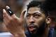 New Orleans Pelicans forward Anthony Davis (23) looks on as he sits on the bench in the second half during an NBA basketball game against the Utah Jazz Monday, March 4, 2019, in Salt Lake City. (AP Photo/Rick Bowmer)