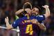 BARCELONA, SPAIN - MARCH 09: Luis Suarez and Ivan Rakitic of FC Barcelona celebrating their team's third goal during the La Liga match between FC Barcelona and Rayo Vallecano de Madrid at Camp Nou on March 09, 2019 in Barcelona, Spain. (Photo by Quality Sport Images/Getty Images)