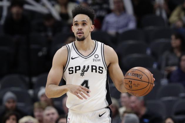 San Antonio Spurs guard Derrick White (4) during the first half of an NBA basketball game against the Denver Nuggets, in San Antonio, Tuesday, March 5, 2019. (AP Photo/Eric Gay)