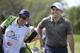 Francesco Molinari, right, of Italy, leaves the first green after making a putt for birdie during the final round of the Arnold Palmer Invitational golf tournament Sunday, March 10, 2019, in Orlando, Fla. (AP Photo/Phelan M. Ebenhack)