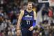 Dallas Mavericks forward Luka Doncic (77) reacts during the first half of an NBA basketball game against the Washington Wizards, Wednesday, March 6, 2019, in Washington. (AP Photo/Nick Wass)