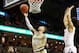 CHARLOTTESVILLE, VA - FEBRUARY 27: Jose Alvarado #10 of the Georgia Tech Yellow Jackets shoots past Kihei Clark #0 of the Virginia Cavaliers in the first half during a game at John Paul Jones Arena on February 27, 2019 in Charlottesville, Virginia. (Photo by Ryan M. Kelly/Getty Images)