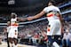 NEW ORLEANS, LA - JANUARY 7: Jrue Holiday #11 hi-fives Anthony Davis #23 of the New Orleans Pelicans on January 7, 2019 at the Smoothie King Center in New Orleans, Louisiana. NOTE TO USER: User expressly acknowledges and agrees that, by downloading and or using this Photograph, user is consenting to the terms and conditions of the Getty Images License Agreement. Mandatory Copyright Notice: Copyright 2019 NBAE (Photo by Layne Murdoch Jr./NBAE via Getty Images)