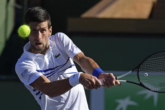Novak Djokovic, of Serbia, returns a shot to Philipp Kohlschreiber at the BNP Paribas Open tennis tournament Tuesday, March 12, 2019 in Indian Wells, Calif. (AP Photo/Mark J. Terrill)