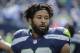 Seattle Seahawks free safety Earl Thomas stands on the field during warmups before an NFL football game against the Dallas Cowboys, Sunday, Sept. 23, 2018, in Seattle. (AP Photo/Elaine Thompson)