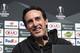 Arsenal's headcoach Unai Emery smiles a she answers journalists' questions during a press conference prior to Thursday's Europa League round of sixteen, 1st leg soccer match, between Rennes and Arsenal, Wednesday, March 6, 2019, in Rennes, western France. (AP Photo/David Vincent)