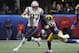New England Patriots' Rob Gronkowski (87) runs against Los Angeles Rams' Nickell Robey-Coleman (23) during the first half of the NFL Super Bowl 53 football game Sunday, Feb. 3, 2019, in Atlanta. (AP Photo/Jeff Roberson)