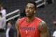 Washington Wizards center Dwight Howard shoots around before an NBA basketball game against the Miami Heat, Thursday, Oct. 18, 2018, in Washington. (AP Photo/Nick Wass)