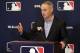 File-This Feb. 8, 2019, file photo shows Rob Manfred, commissioner of Major League Baseball, speaking during a news conference at owners meetings in Orlando, Fla. Major League Baseball and the players' union are near an agreement to expand active rosters by one to 26 starting in 2020 as part of a deal that would include a commitment to discuss larger economic issues after opening day. (AP Photo/John Raoux, File)