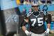 Carolina Panthers' Matt Kalil (75) makes his way onto the field during introductions before an NFL football game against the Minnesota Vikings in Charlotte, N.C., Sunday, Dec. 10, 2017. The Panthers won 31-24. (AP Photo/Bob Leverone)