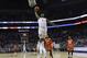 Duke's Zion Williamson (1) goes up to dunk against Syracuse during the first half of an NCAA college basketball game in the Atlantic Coast Conference tournament in Charlotte, N.C., Thursday, March 14, 2019. (AP Photo/Chuck Burton)