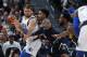 Dallas Mavericks forward Luka Doncic, left, looks to pass the ball as Denver Nuggets guards Gary Harris and Will Barton defend during the first half of an NBA basketball game Thursday, March 14, 2019, in Denver. (AP Photo/David Zalubowski)