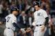 NEW YORK, NY - OCTOBER 03: (NEW YORK DAILIES OUT) Aaron Judge #99 and Giancarlo Stanton #27 of the New York Yankees during the sixth inning against the Oakland Athletics in the American League Wild Card Game at Yankee Stadium on October 3, 2018 in the Bronx borough of New York City. The Yankees defeated the Athletics 7-2. (Photo by Jim McIsaac/Getty Images)
