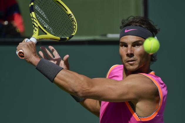 Rafael Nadal, of Spain, keeps his eyes on the ball as he hits a return to Karen Khachanov, of Russia, at the BNP Paribas Open tennis tournament Friday, March 15, 2019, in Indian Wells, Calif. (AP Photo/Mark J. Terrill)