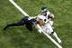 NEW ORLEANS, LOUISIANA - JANUARY 13: Golden Tate #19 of the Philadelphia Eagles avoids the tackle attempt of P.J. Williams #26 of the New Orleans Saints during the first quarter in the NFC Divisional Playoff Game at Mercedes Benz Superdome on January 13, 2019 in New Orleans, Louisiana. (Photo by Jonathan Bachman/Getty Images)
