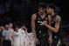 Xavier guard Paul Scruggs, right, consoles teammate guard Quentin Goodin after a play against Villanova during overtime of an NCAA college basketball semifinal game in the Big East men's tournament, Friday, March 15, 2019, in New York. Villanova won 71-67 in overtime. (AP Photo/Julio Cortez)