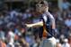 Houston Astros manager AJ Hinch motions to the bullpen as he walks out to the mound to make pitching change during the third inning of an exhibition spring training baseball game against the Washington Nationals Sunday, March 3, 2019, in West Palm Beach, Fla. (AP Photo/Jeff Roberson)