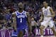 Duke's Zion Williamson (1) reacts after a dunk as North Carolina's Garrison Brooks (15) looks on during the second half of an NCAA college basketball game in the Atlantic Coast Conference tournament in Charlotte, N.C., Friday, March 15, 2019. (AP Photo/Nell Redmond)