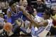 Duke's RJ Barrett, left, and North Carolina's Kenny Williams, right, chase a loose ball during the second half of an NCAA college basketball game in the Atlantic Coast Conference tournament in Charlotte, N.C., Friday, March 15, 2019. (AP Photo/Chuck Burton)