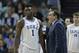 Duke's Zion Williamson (1) talks with head coach Mike Krzyzewski, right, during the second half of an NCAA college basketball game against Syracuse in the Atlantic Coast Conference tournament in Charlotte, N.C., Thursday, March 14, 2019. (AP Photo/Nell Redmond)