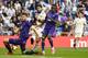 Real Madrid's Spanish midfielder Isco (2L) shoots between Celta Vigo's Dutch defender Wesley Hoedt (L) and Celta Vigo's Danish forward Pione Sisto during the Spanish league football match between Real Madrid CF and RC Celta de Vigo at the Santiago Bernabeu stadium in Madrid on March 16, 2019. (Photo by GABRIEL BOUYS / AFP) (Photo credit should read GABRIEL BOUYS/AFP/Getty Images)