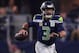 ARLINGTON, TEXAS - JANUARY 05: Russell Wilson #3 of the Seattle Seahawks looks for an open receiver against the Dallas Cowboys during the Wild Card Round at AT&T Stadium on January 05, 2019 in Arlington, Texas. (Photo by Tom Pennington/Getty Images)