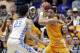 Tennessee's Grant Williams, right, protects the ball from Kentucky forward EJ Montgomery (23) in the first half of an NCAA college basketball game at the Southeastern Conference tournament Saturday, March 16, 2019, in Nashville, Tenn. (AP Photo/Mark Humphrey)