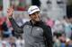 Jon Rahm, of Spain, waves to the gallery as he arrives at the 17th hole during the third round of The Players Championship golf tournament Saturday, March 16, 2019, in Ponte Vedra Beach, Fla. (AP Photo/Gerald Herbert)