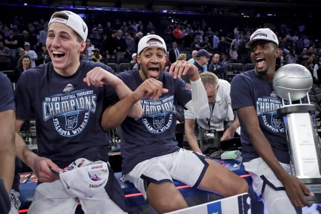 Villanova's Collin Gillespie, left, Phil Booth, and Dhamir Cosby-Roundtree celebrate after defeating Seton Hall 74-72 in an NCAA college basketball game in the championship of the Big East Conference tournament, Saturday, March 16, 2019, in New York. (AP Photo/Julio Cortez)