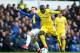 LIVERPOOL, ENGLAND - MARCH 17: Ngolo Kante of Chelsea is tackled by Bernard of Everton during the Premier League match between Everton FC and Chelsea FC at Goodison Park on March 17, 2019 in Liverpool, United Kingdom. (Photo by Alex Livesey/Getty Images)