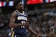 New Orleans Pelicans guard Jrue Holiday (11) in the first half of an NBA basketball game Saturday, March 2, 2019, in Denver. (AP Photo/David Zalubowski)