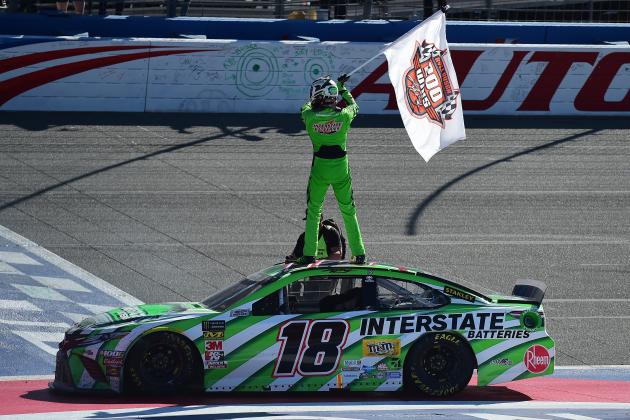 FONTANA, CA - MARCH 17: Kyle Busch, driver of the #18 Interstate Batteries Toyota, celebrates after winning the Monster Energy NASCAR Cup Series Auto Club 400 and winning his 200th NASCAR race at Auto Club Speedway on March 17, 2019 in Fontana, California. (Photo by Jared C. Tilton/Getty Images)