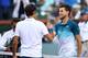 INDIAN WELLS, CALIFORNIA - MARCH 17: Dominic Thiem of Austria shakes hands with Roger Federer of Switzerland after his men's singles final victory on day fourteen of the BNP Paribas Open at the Indian Wells Tennis Garden on March 17, 2019 in Indian Wells, California. (Photo by Clive Brunskill/Getty Images)